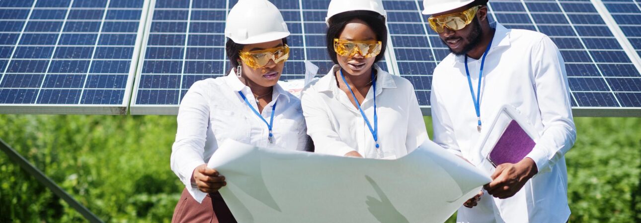 african-american-technician-checks-maintenance-solar-panels-group-three-black-engineers-meeting-solar-station african-american-technician-checks-maintenance-solar-panels-group-three-black-engineers-meeting-solar-station